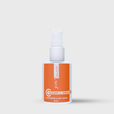 JusTouch Vitamin C serum bottle with orange label on a white background