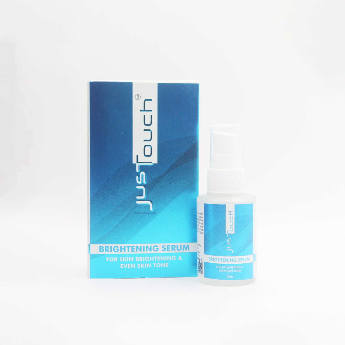 Just Touch brightening serum bottle with packaging on a white background