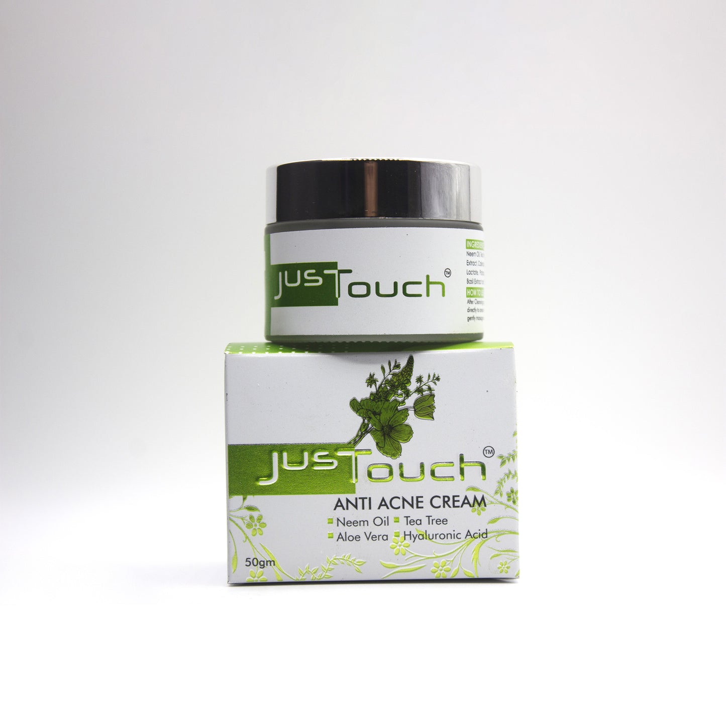 Just Touch anti-acne cream jar and box on a white background
